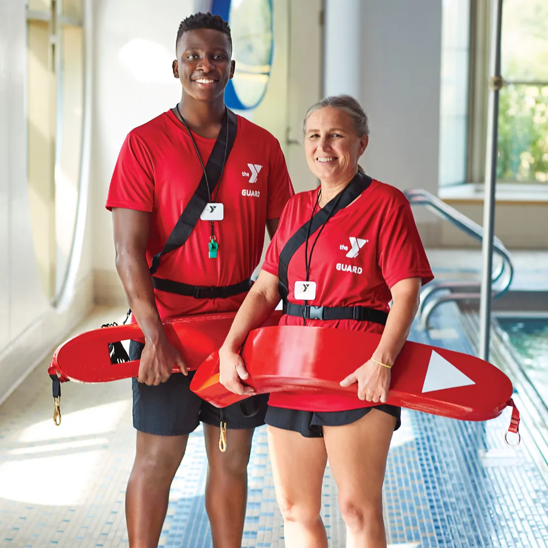 two lifeguards at a YMCA pool